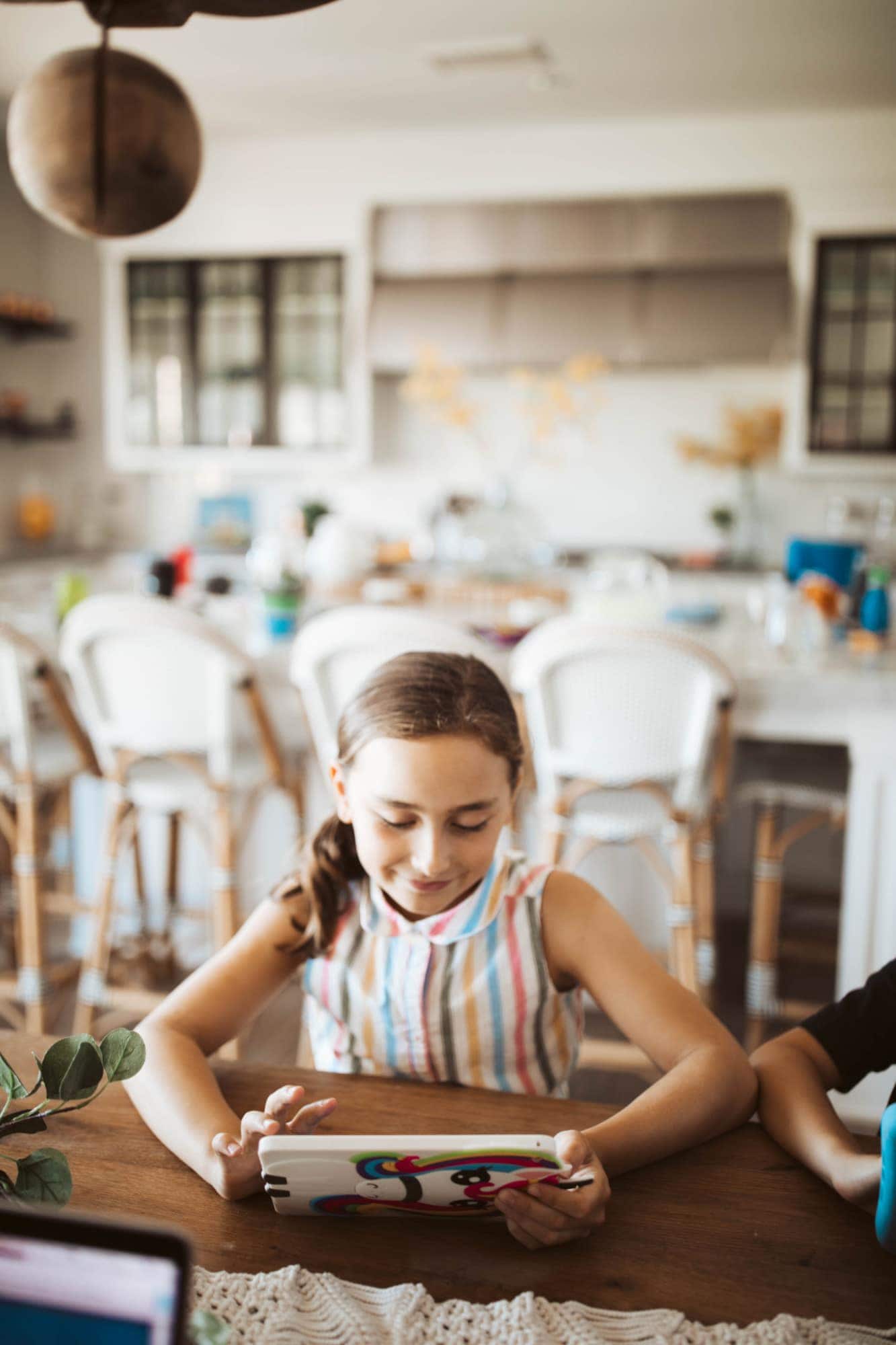 girl playing with iPad