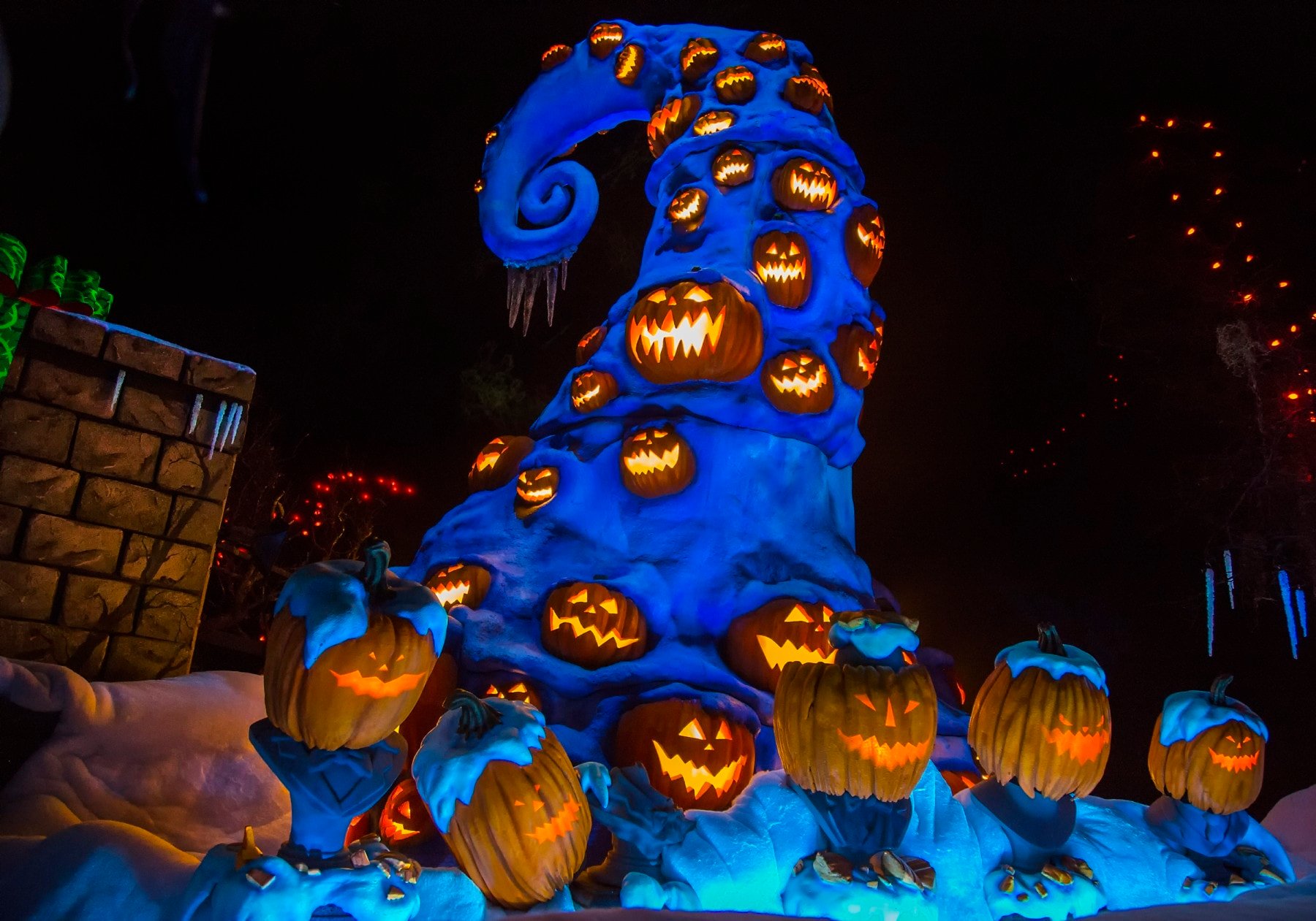 A pile of pumpkins at Disneyland during Halloween.