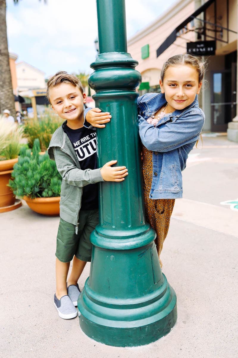 kids playing on pole