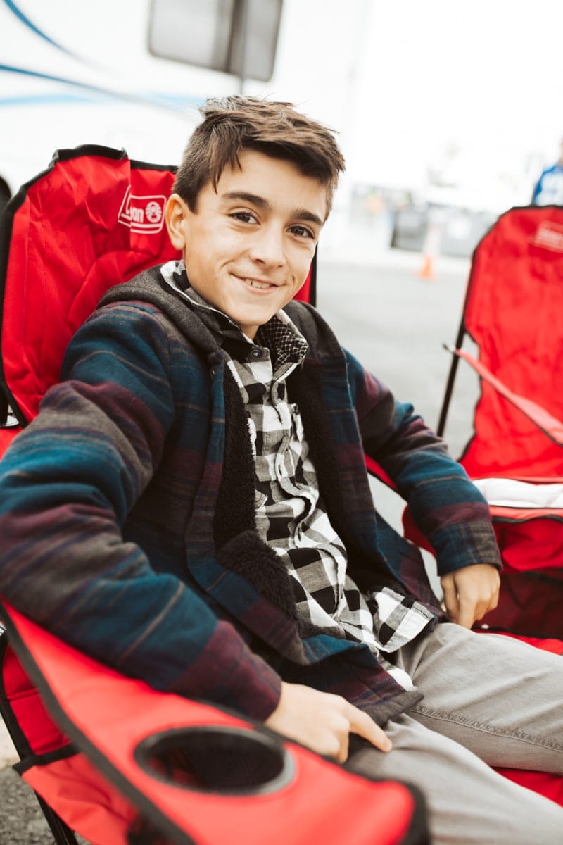 boy sitting in chair 