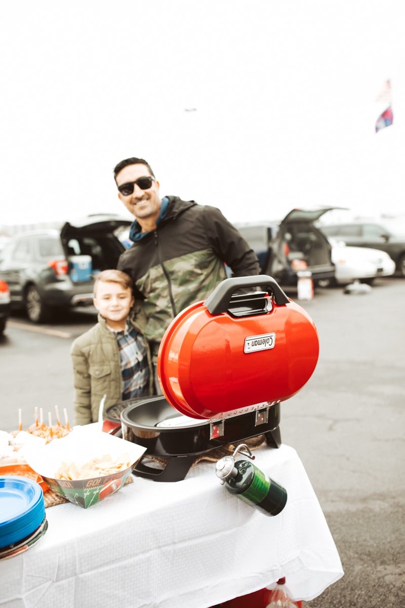 dad and son at tailgate 