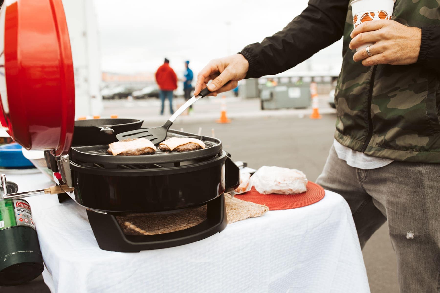 guy grilling hot-dogs 