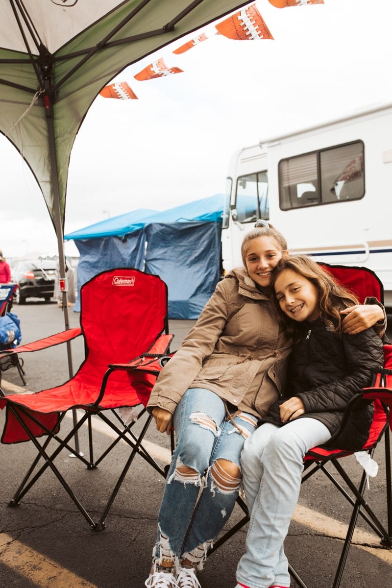 girl friends at a tailgating cookout 