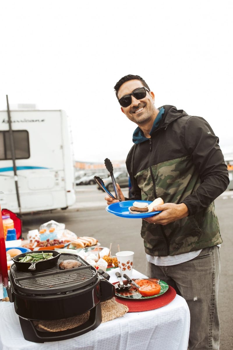 man grilling burgers 