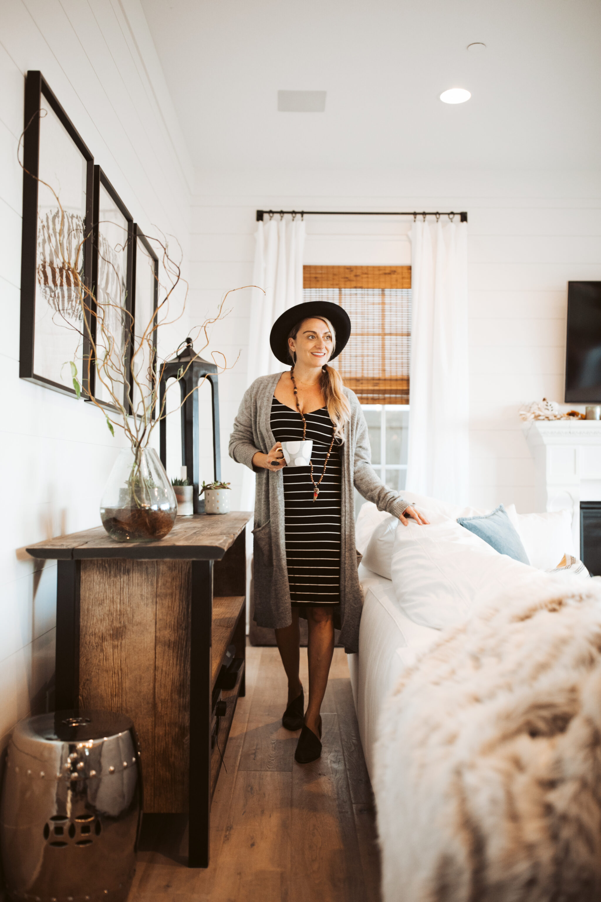 woman in living room drinking coffee