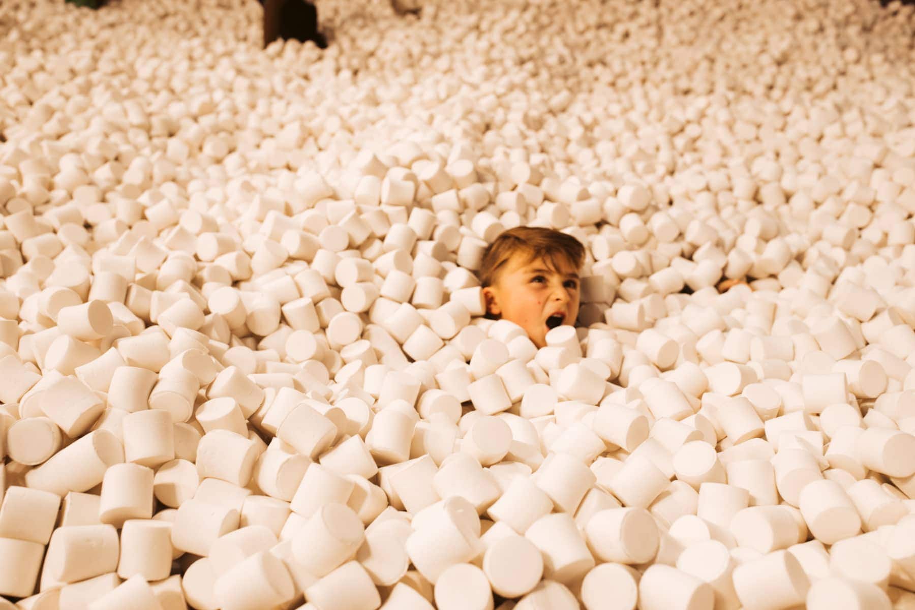 boy in marshmallow pit