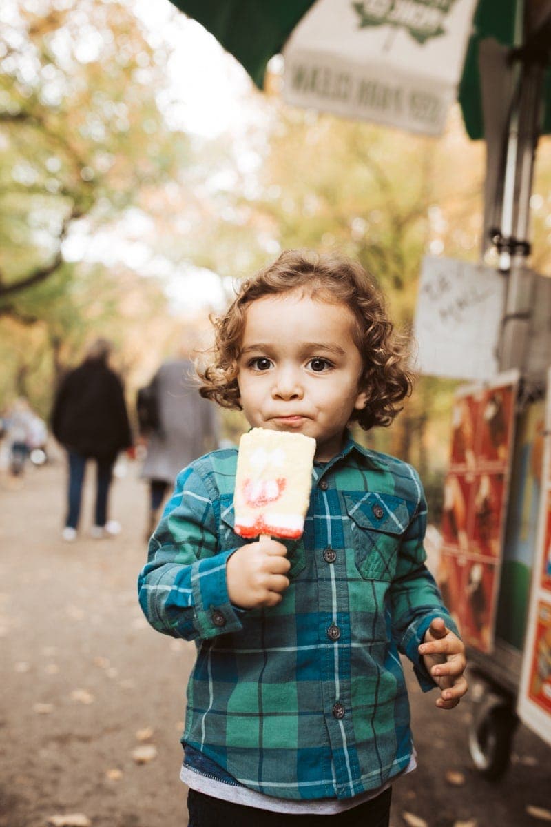 boy eating popsicle