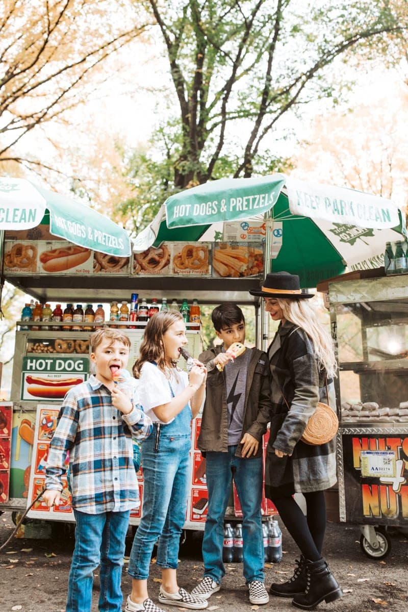 Family at hot dog stand in NYC