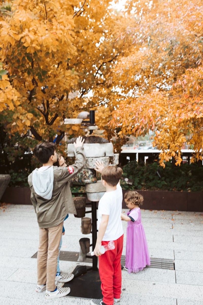 Kids touching art