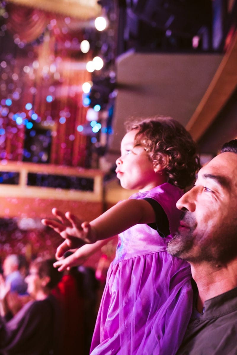 father and son at a play