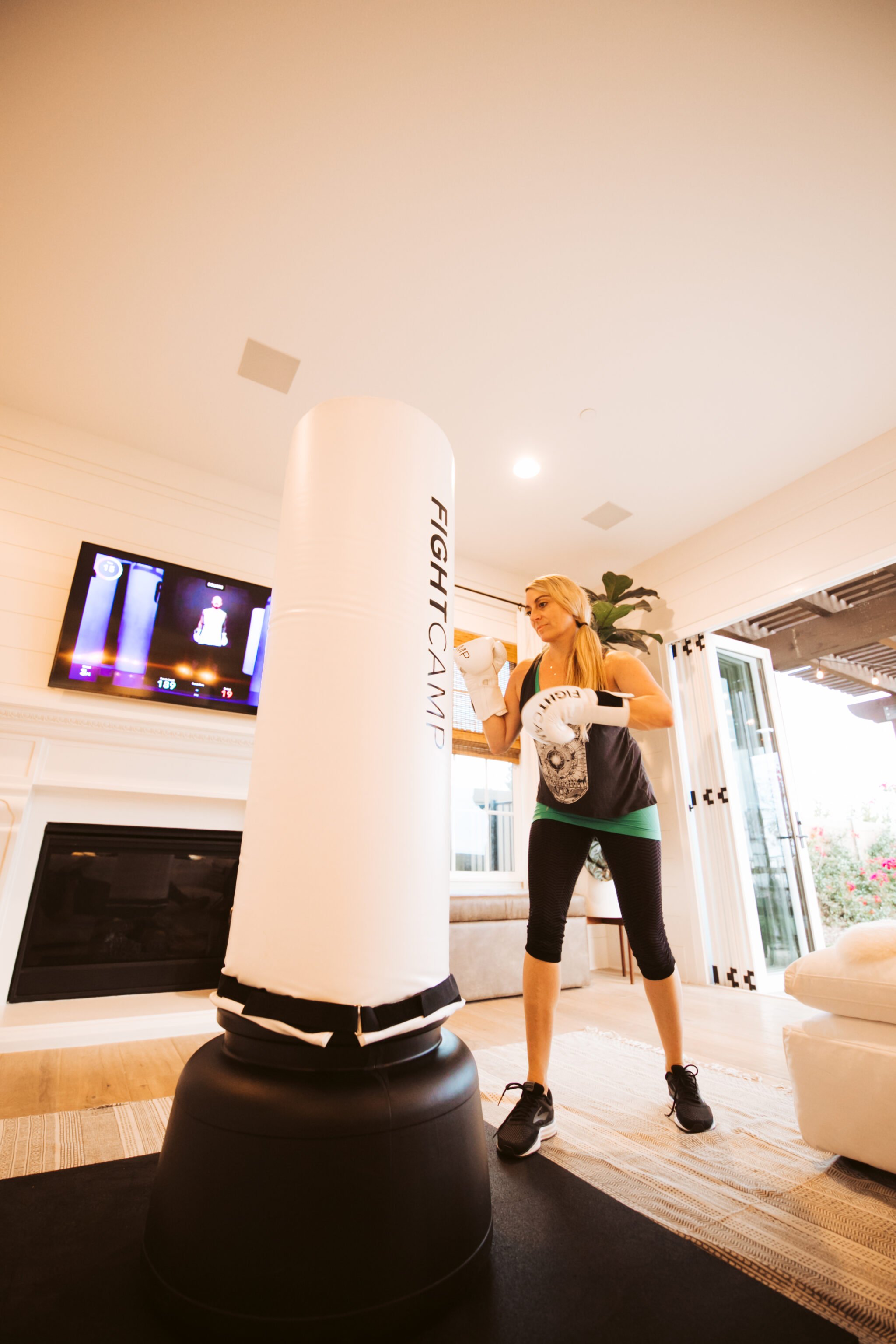 woman boxing in living room