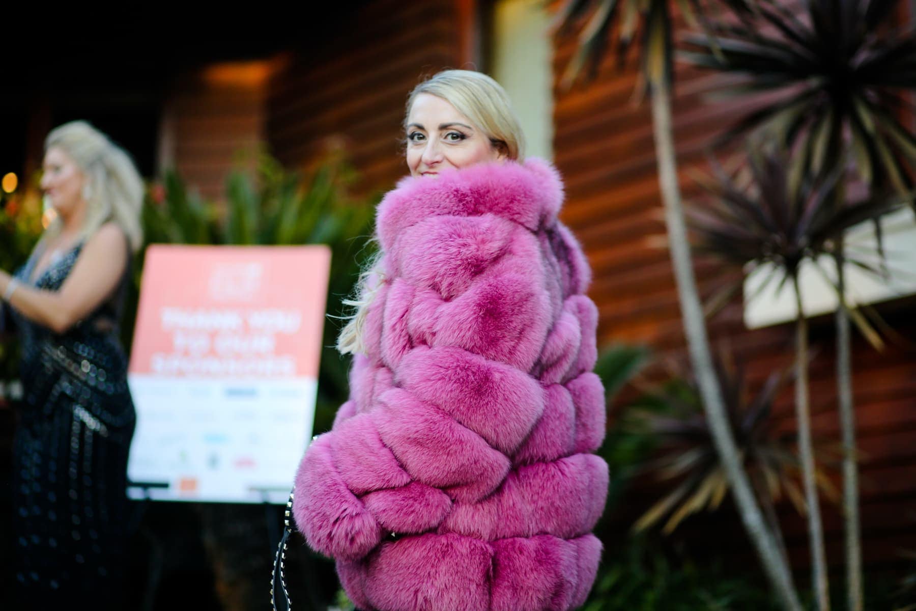 woman in pink coat