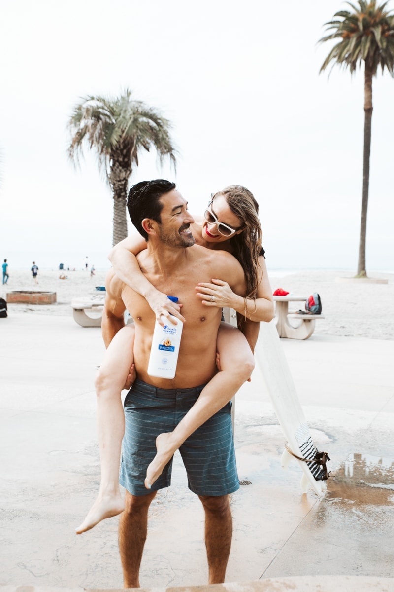 husband and wife surfers