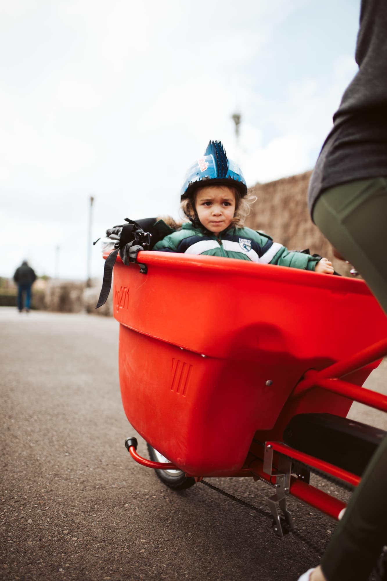 child in bucket bike