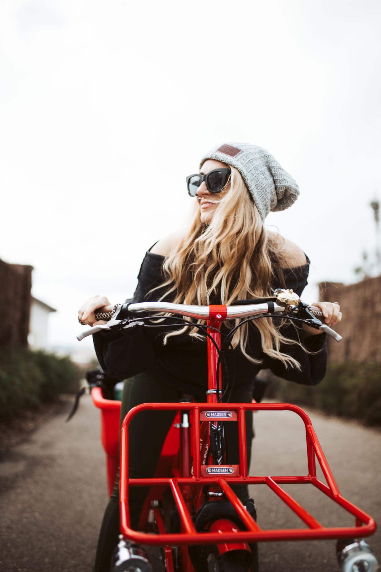 woman on red bike