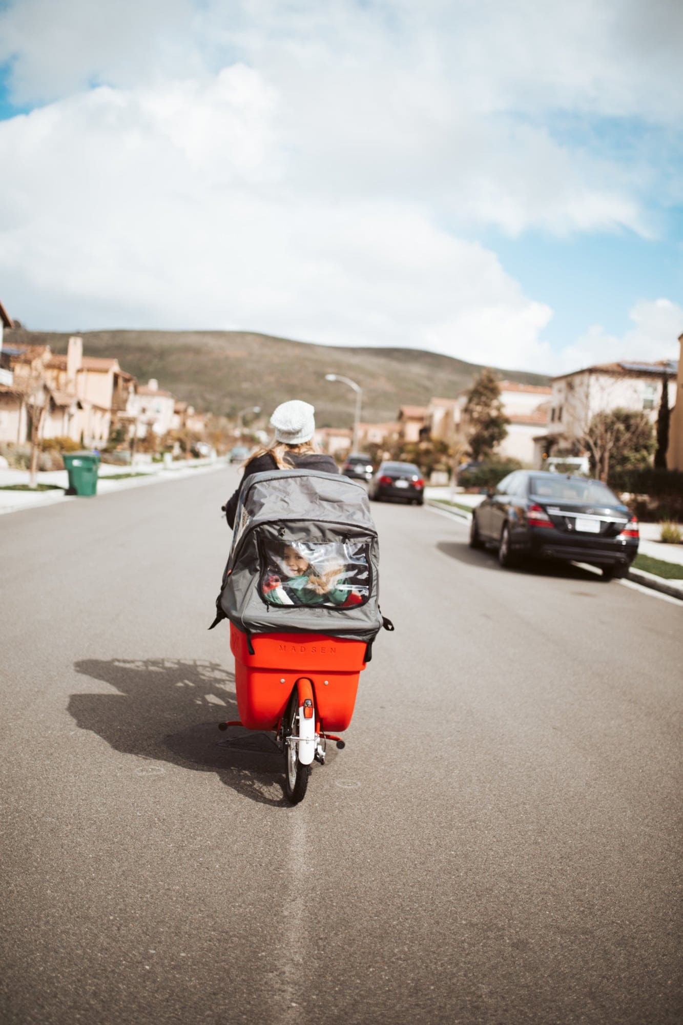 mom and child on bike