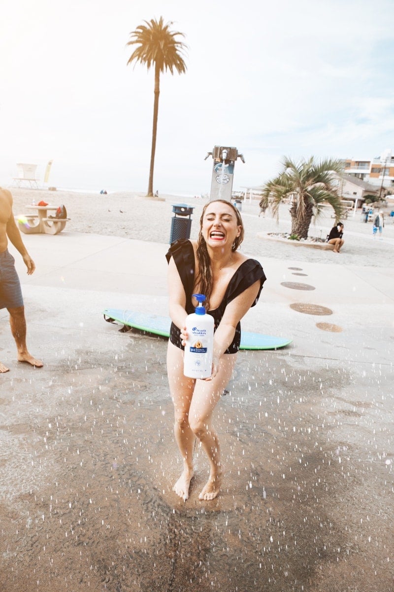 girl at beach shower