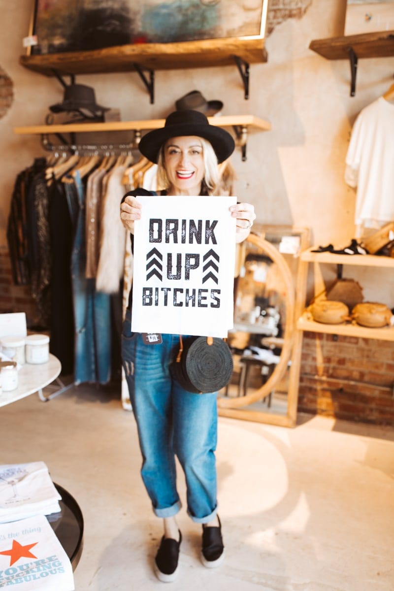 woman holding sign