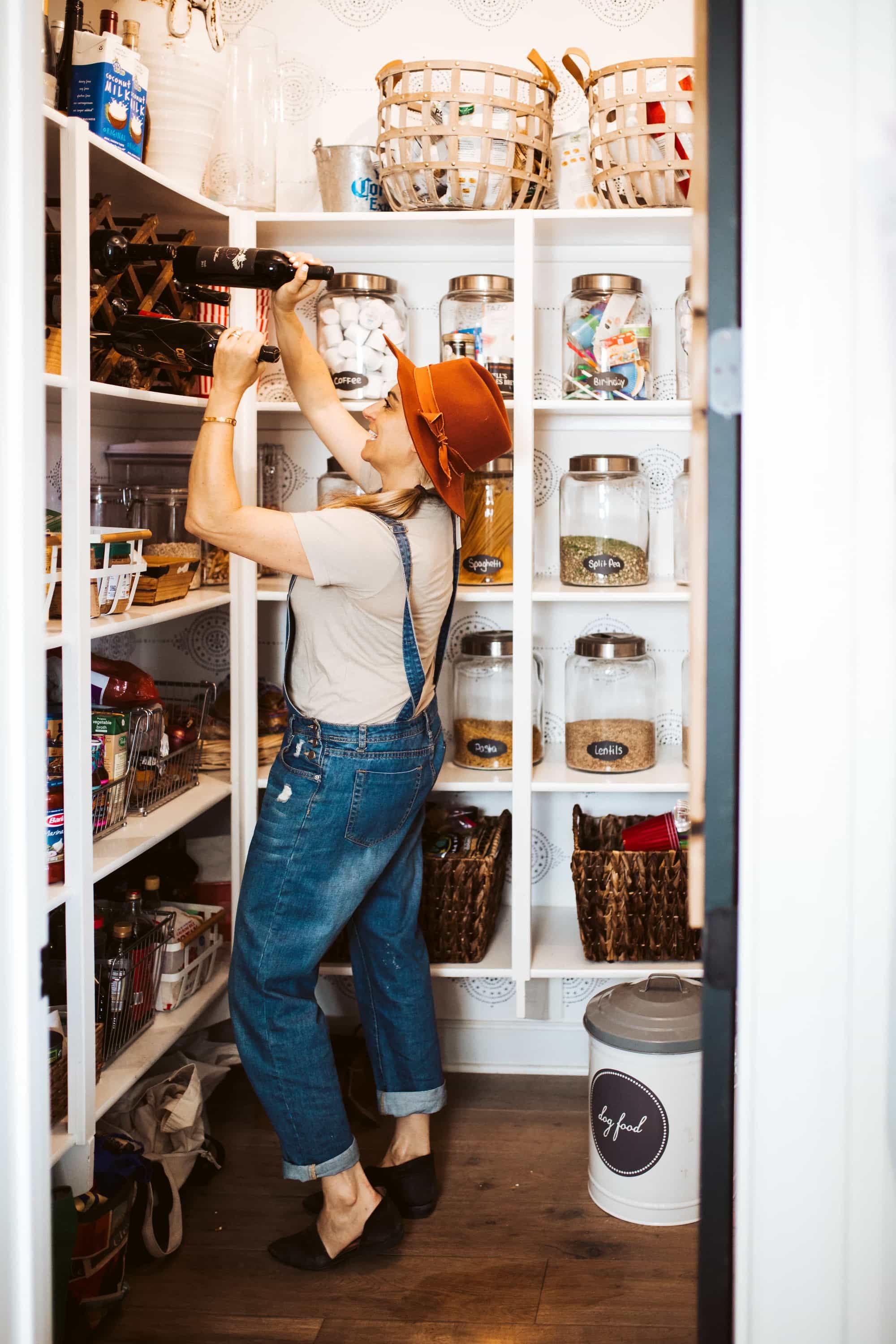 woman cleaning the pantry