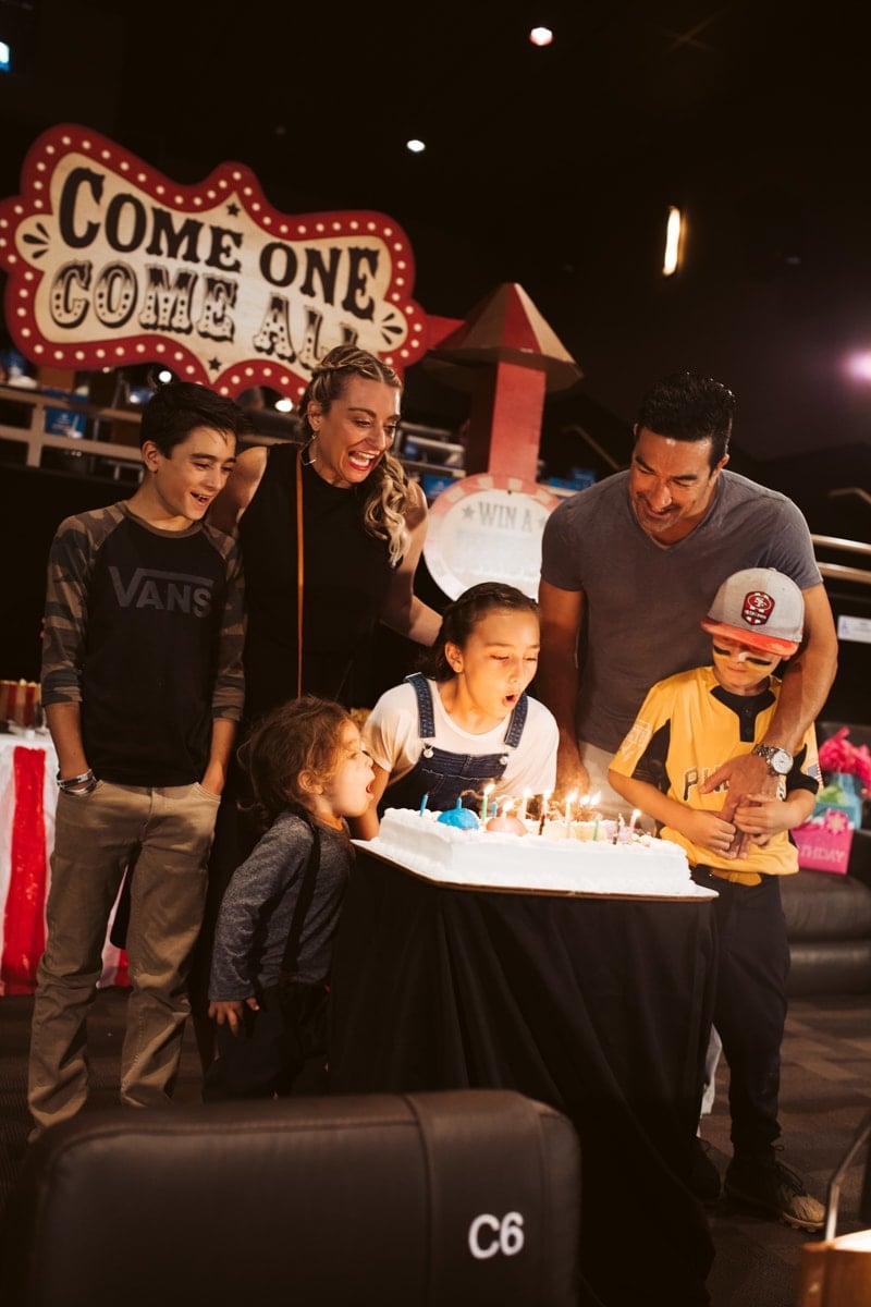 family singing happy birthday