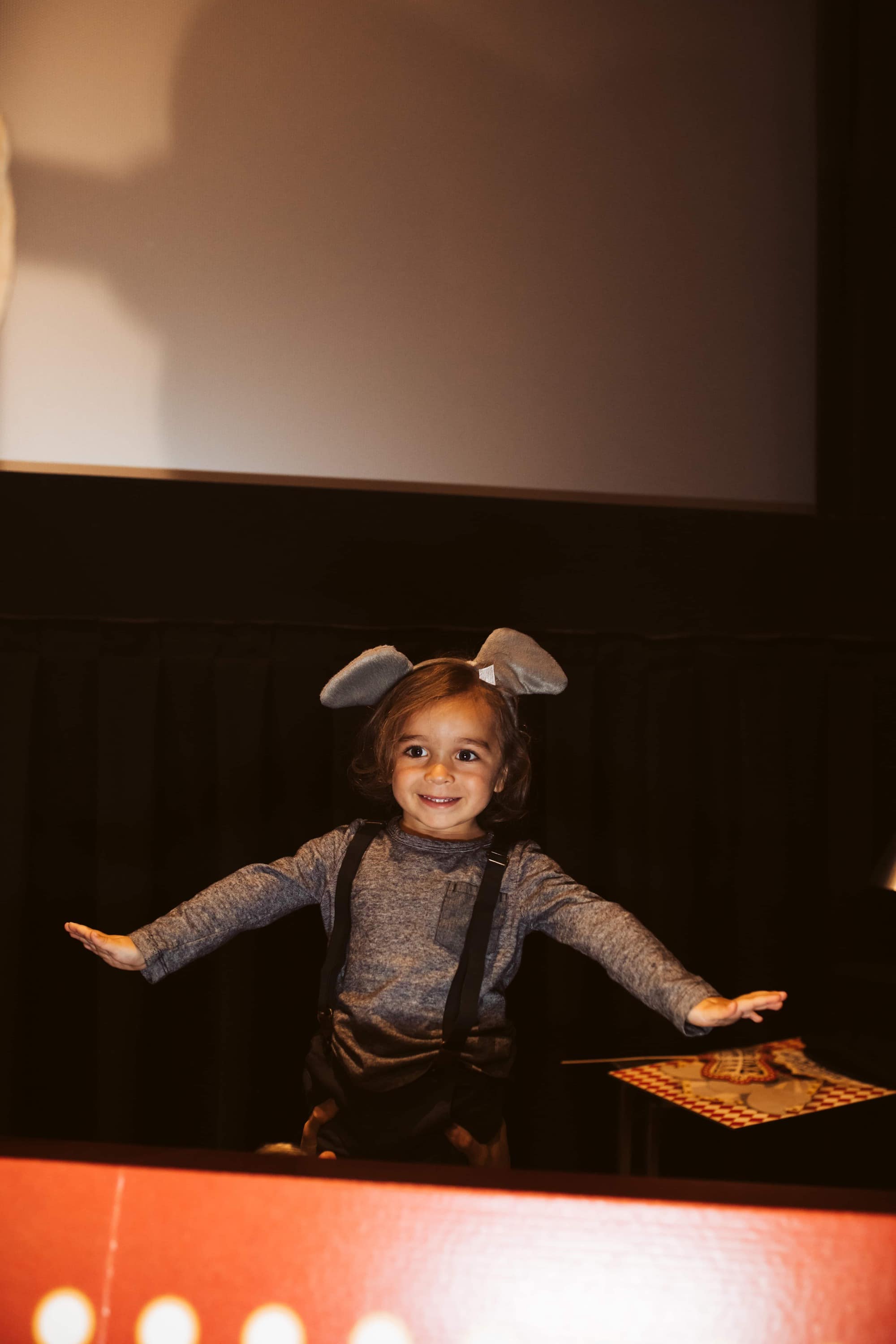 kid playing theater