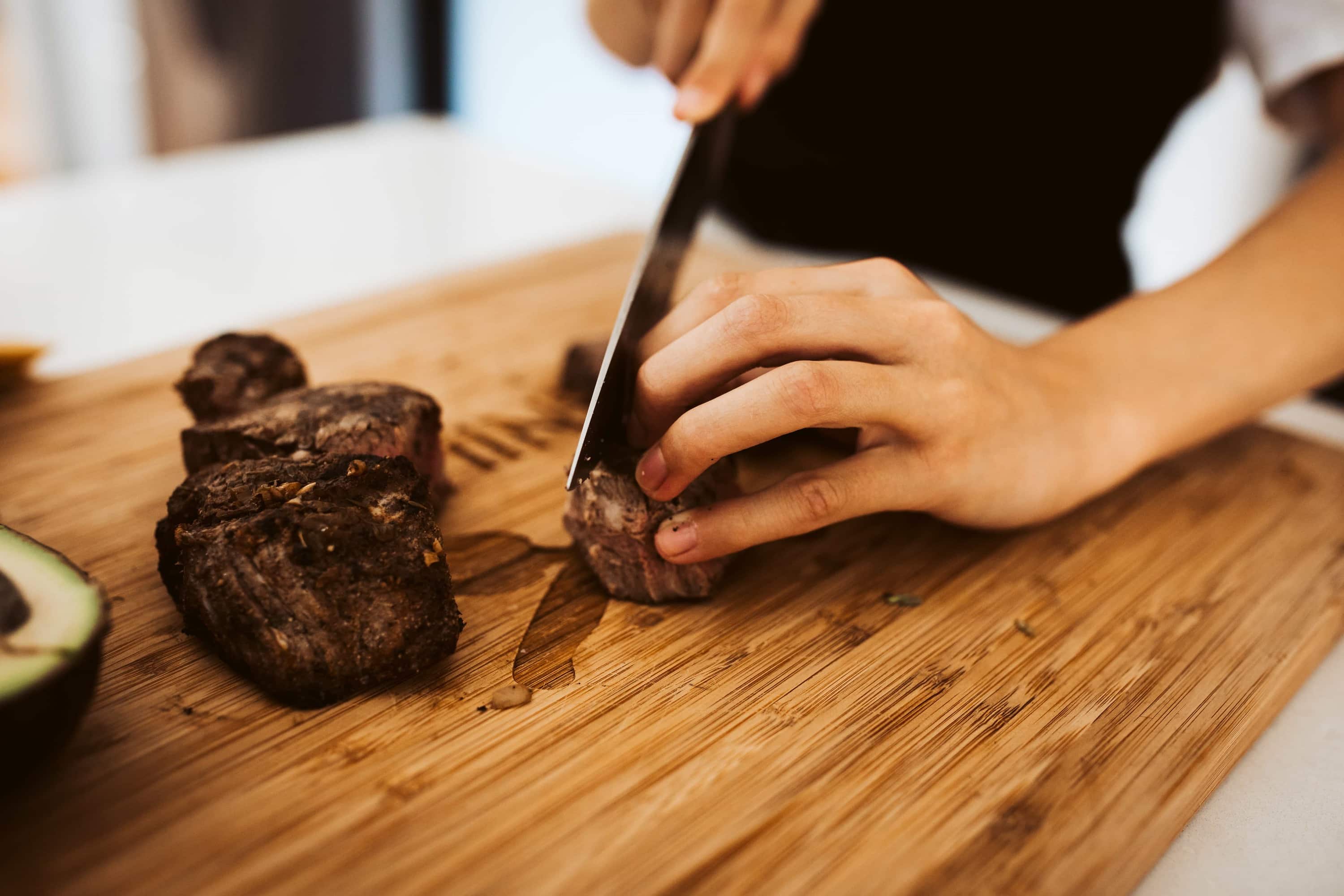 chef slicing meat