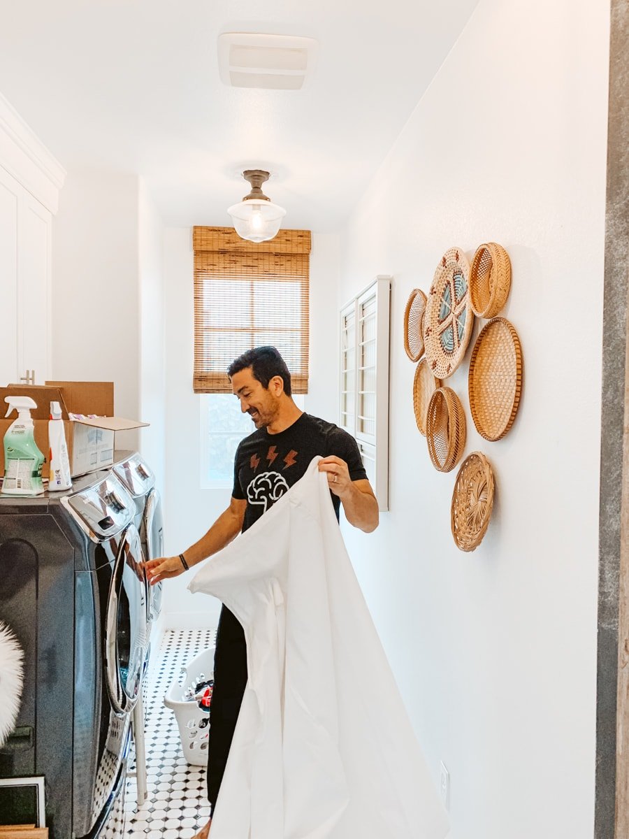 man doing laundry