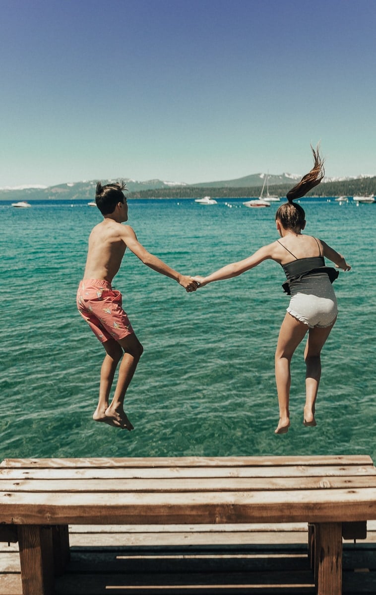 kids jumping in lake