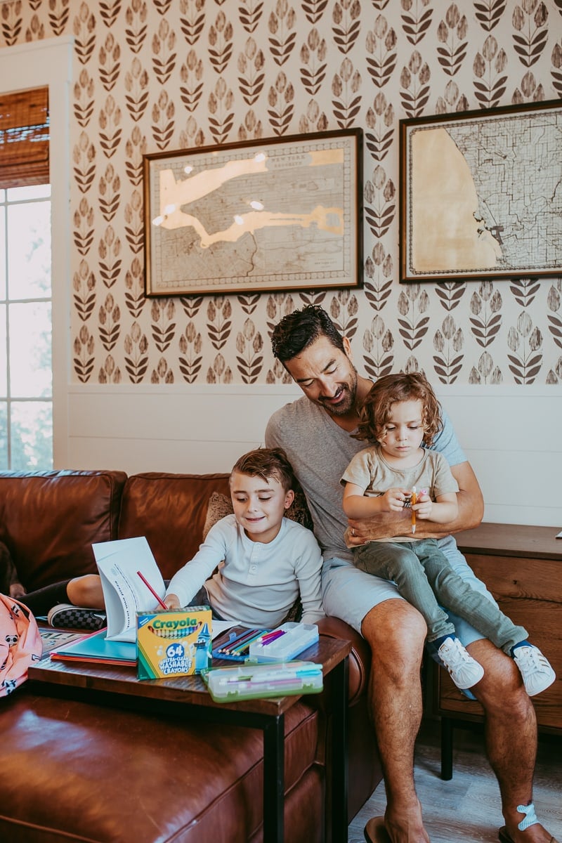 dad doing homework with kids