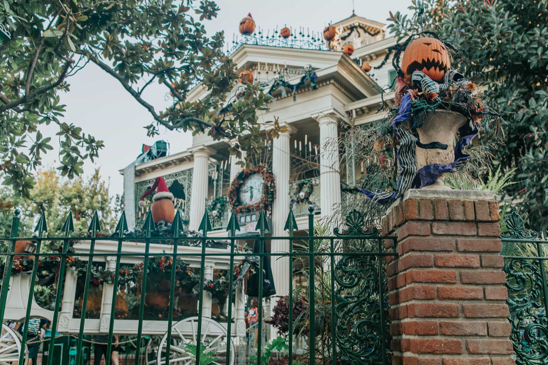 Decorations outside Disney's haunted mansion at Halloween.
