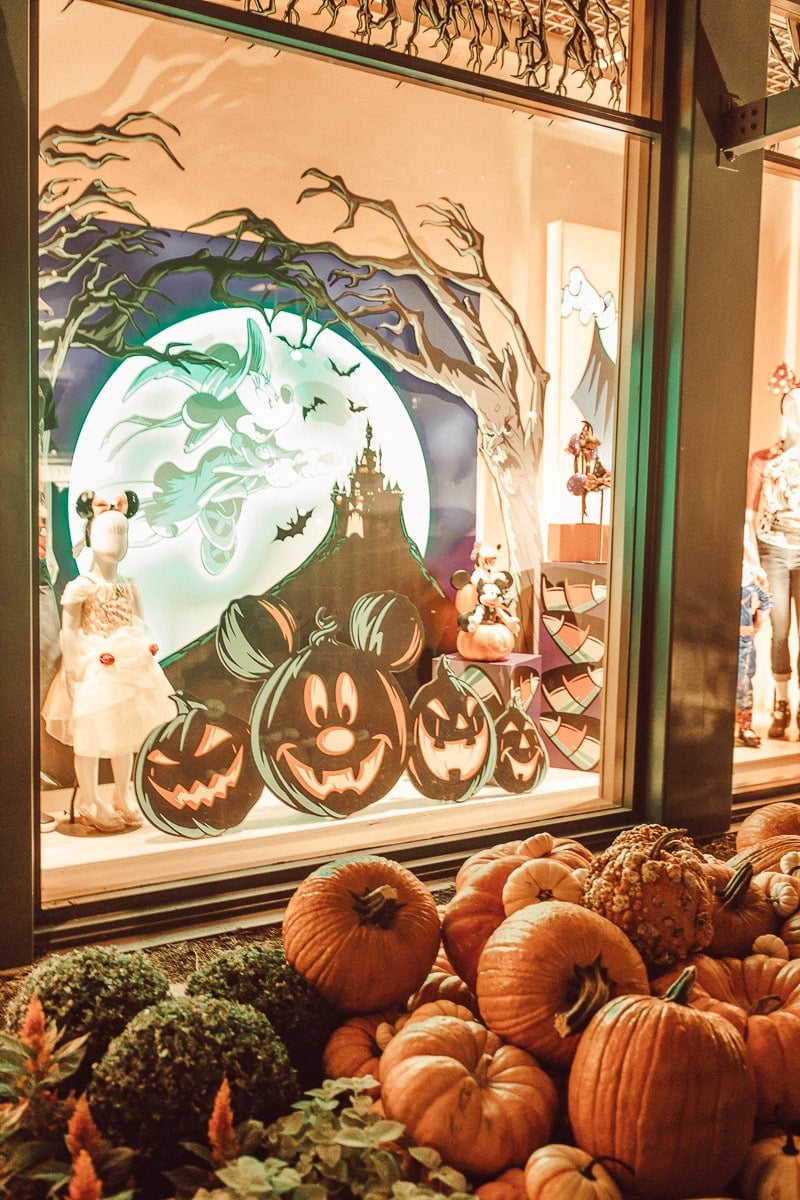 Halloween decorations inside a shop window at Disneyland.