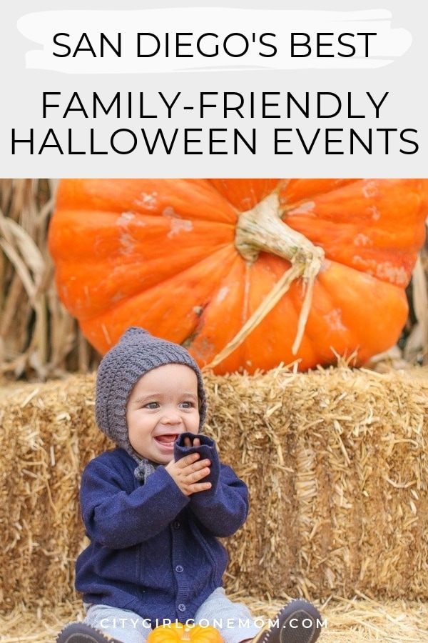 baby with pumpkins