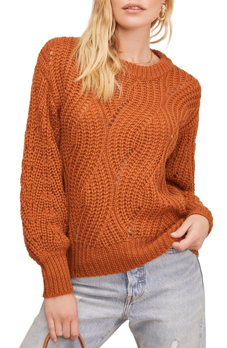 woman in orange sweater