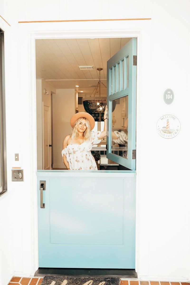 woman posing at door