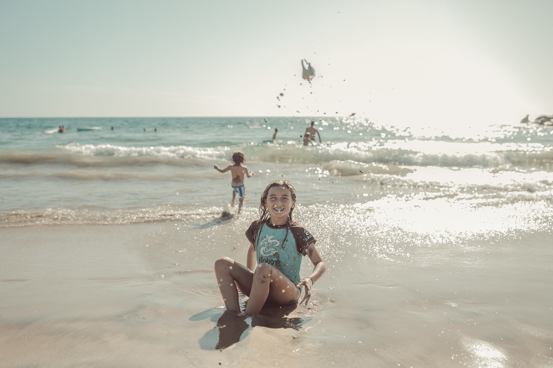 kids playing at the beach