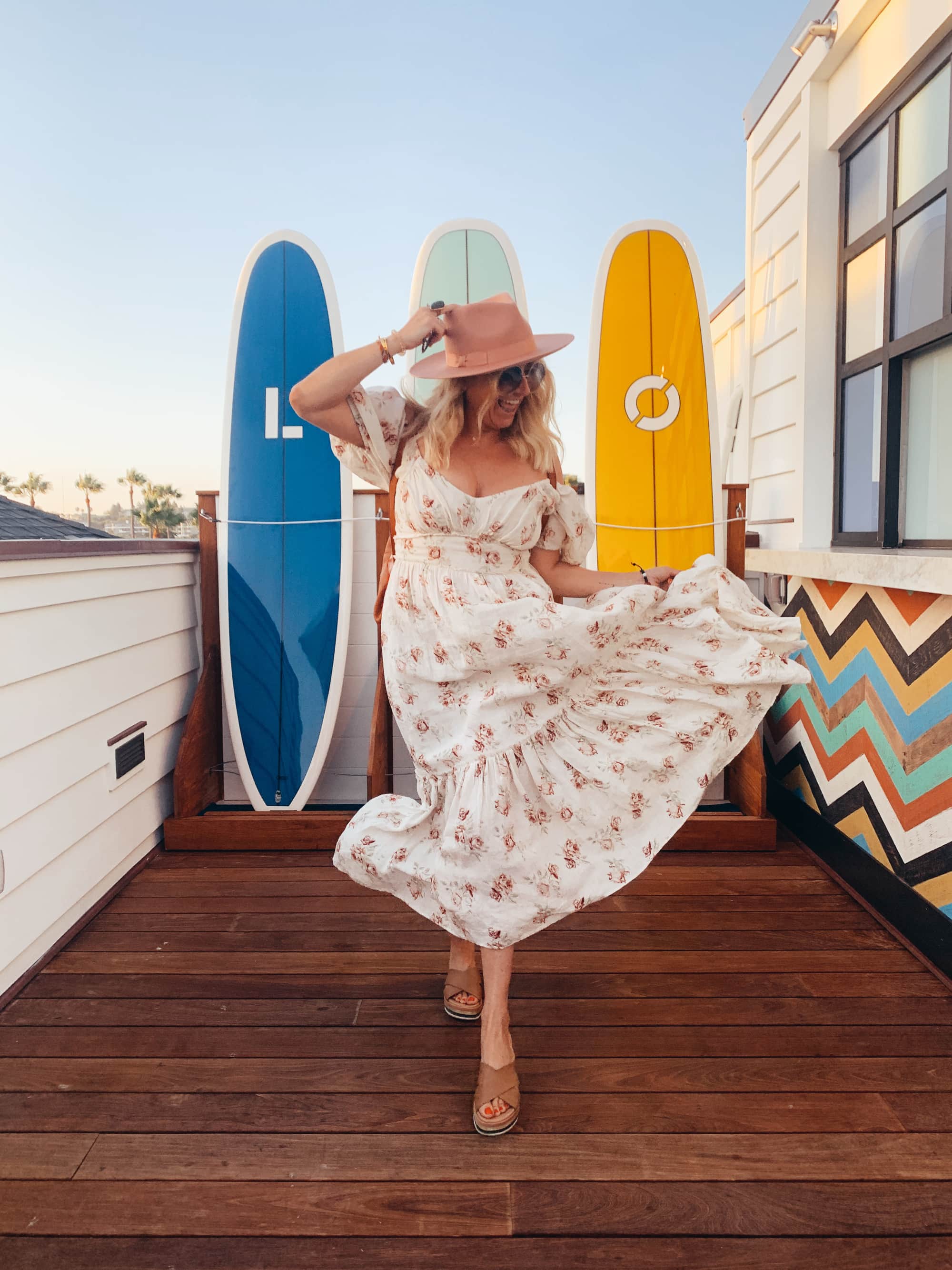 woman with surfboards