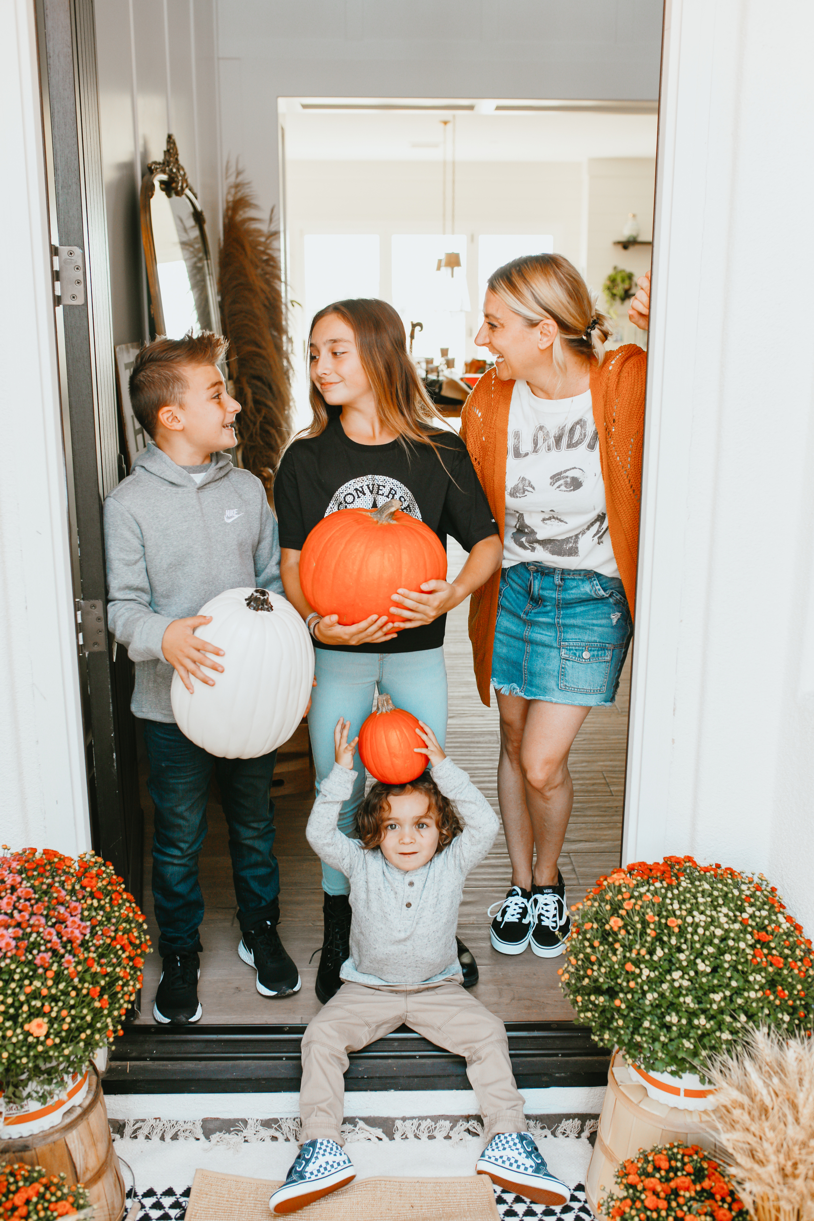 family with pumpkins