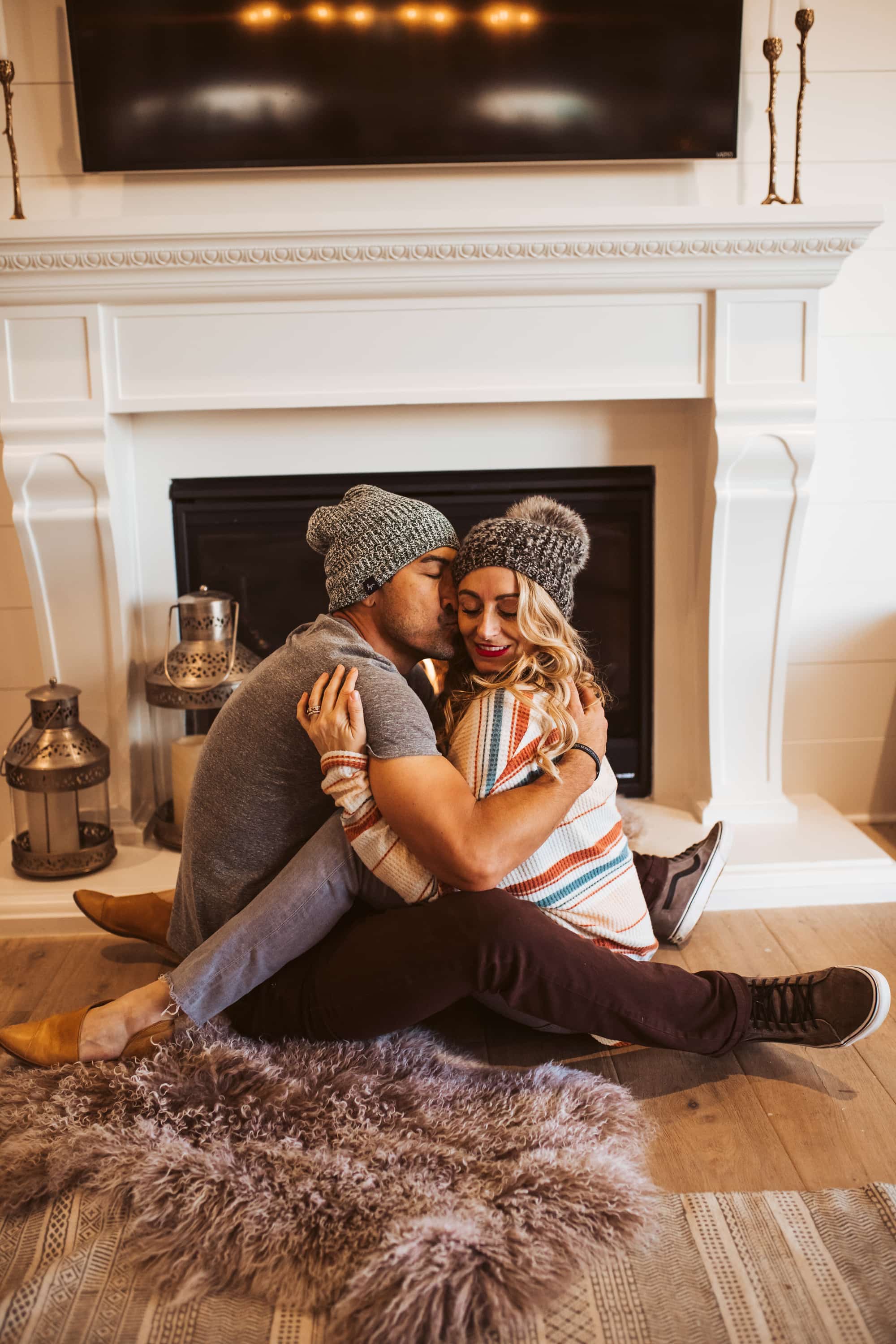 couple by fireplace