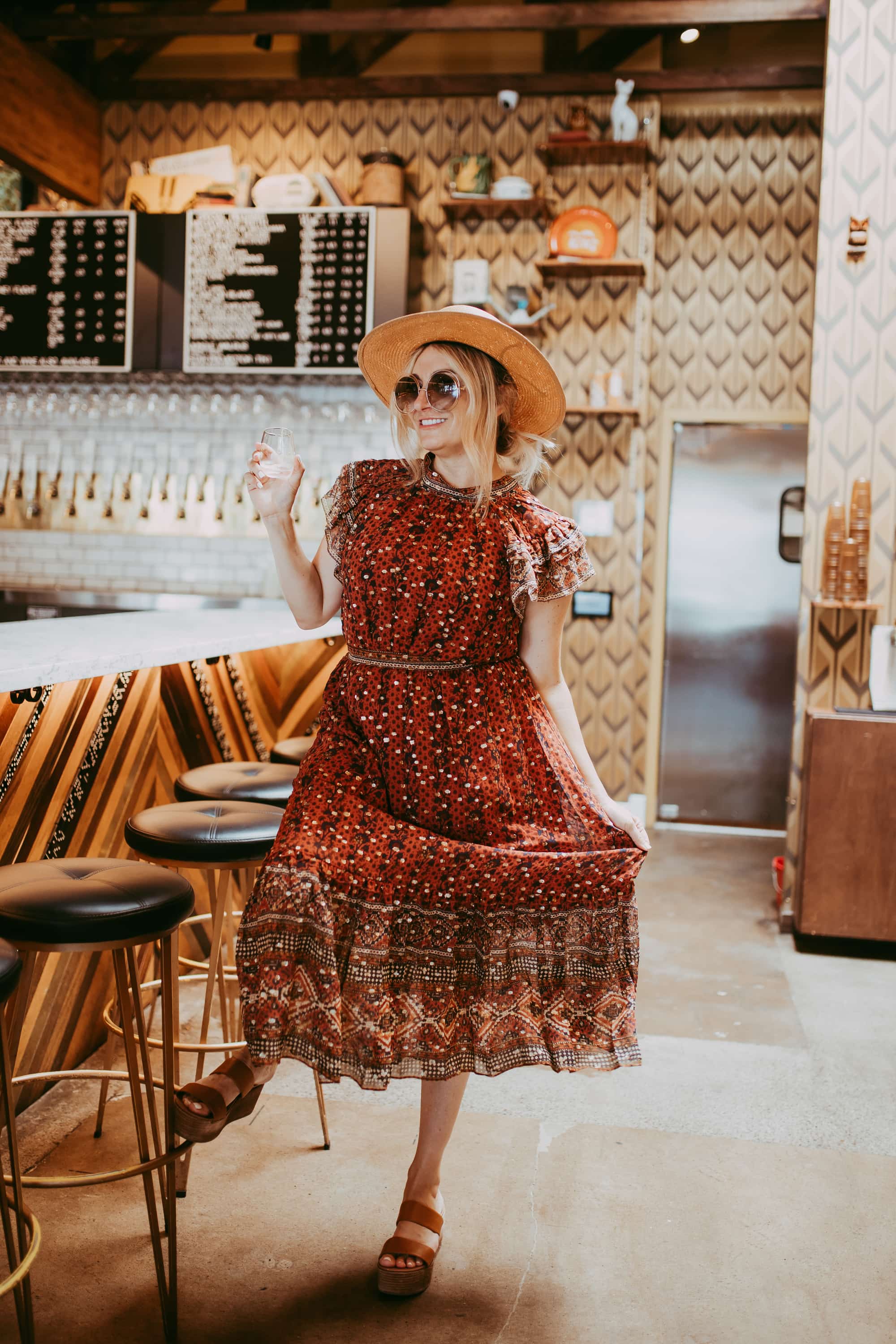 woman standing at bar