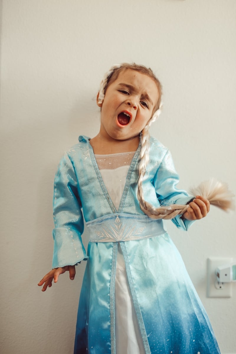 toddler singing and dressing up