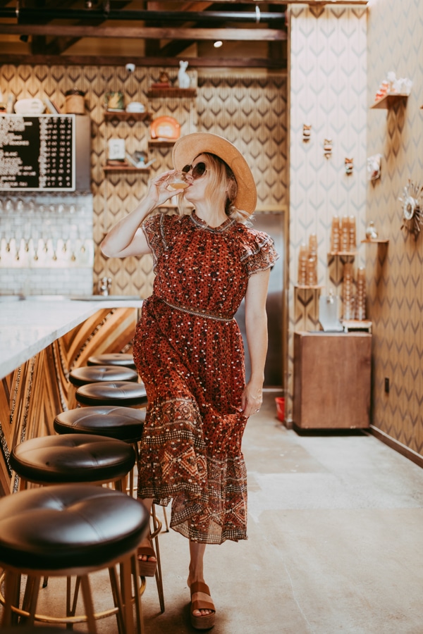 woman drinking at bar