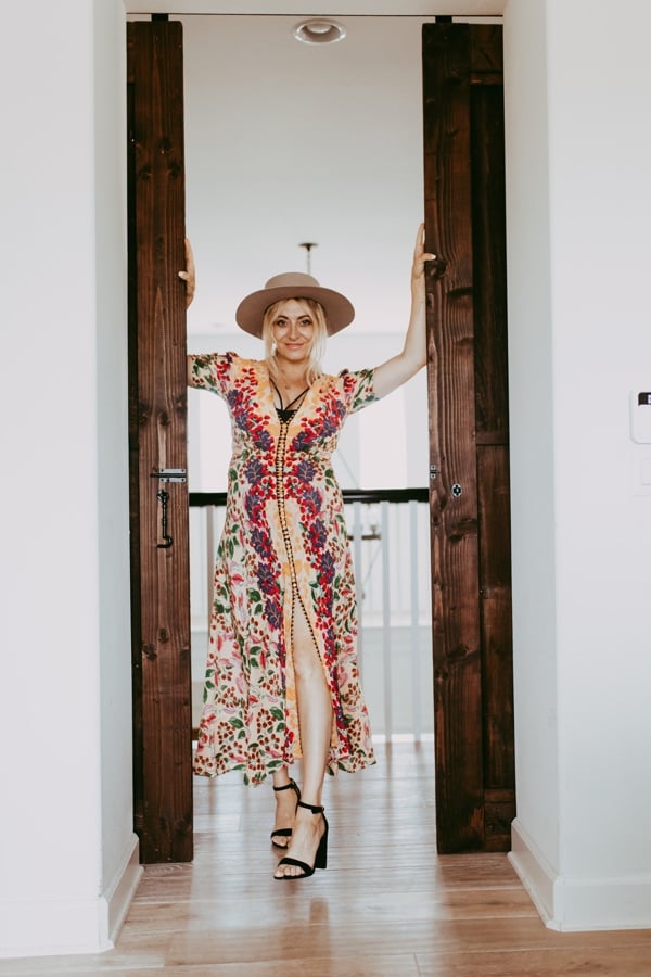 woman standing in doorway