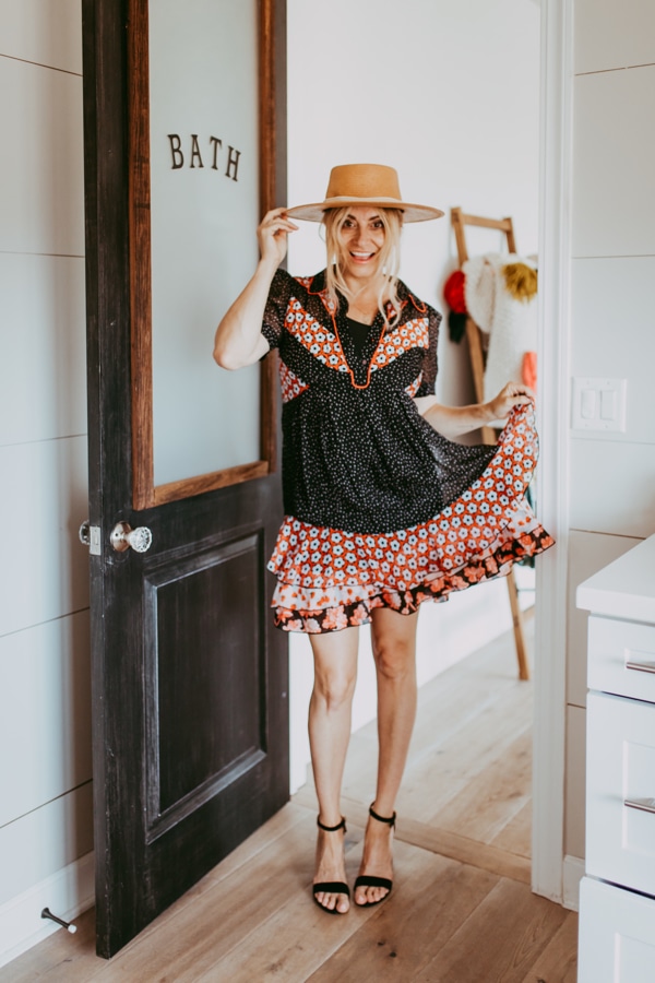 woman in dress and hat