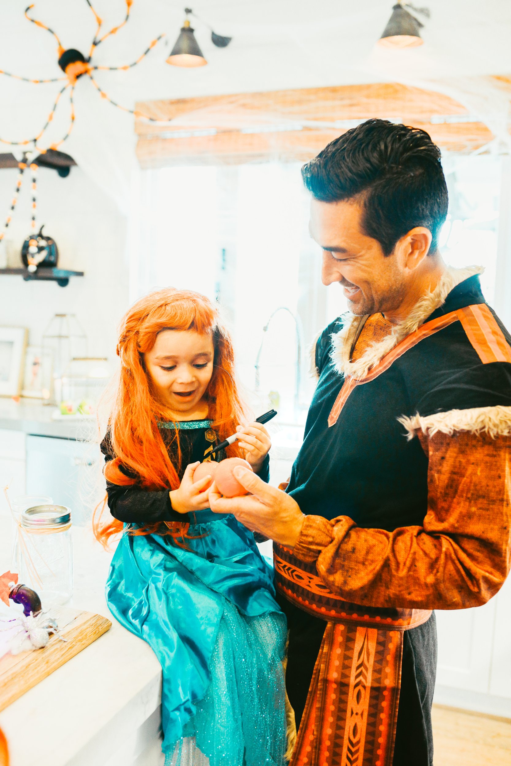 dad and kid dressed up in costumes