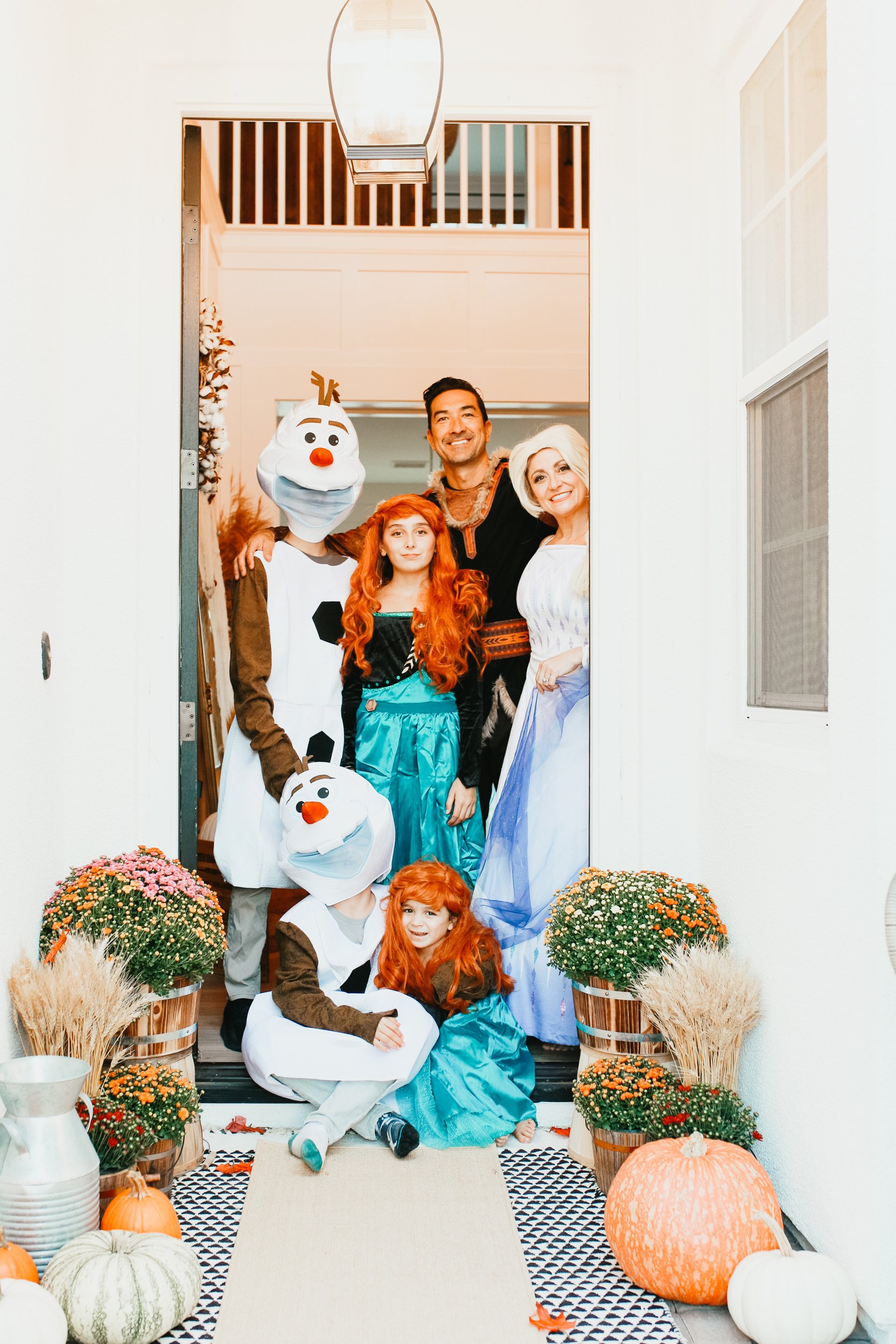 disney frozen family in costumes