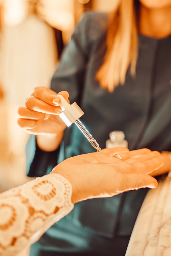 woman's hand trying oils