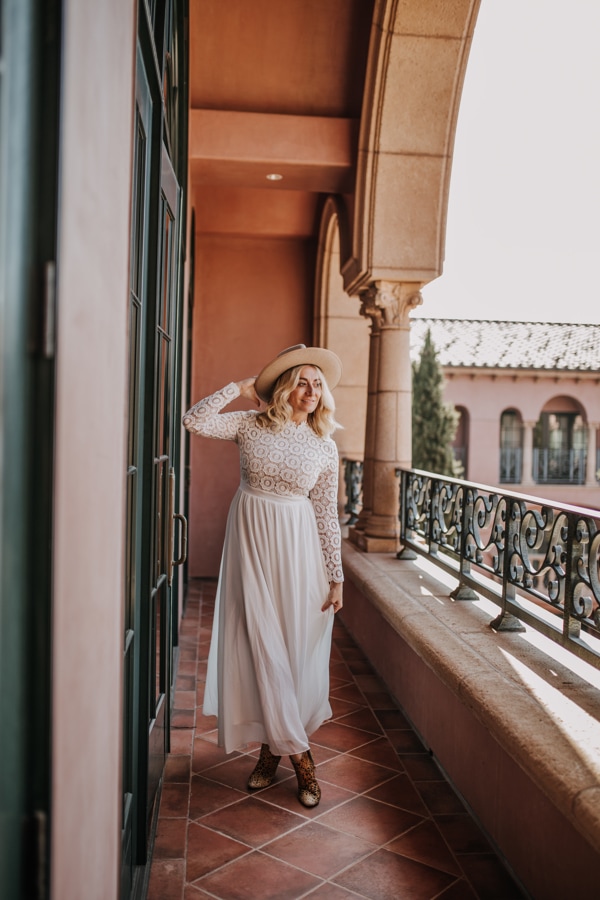 woman walking on balcony