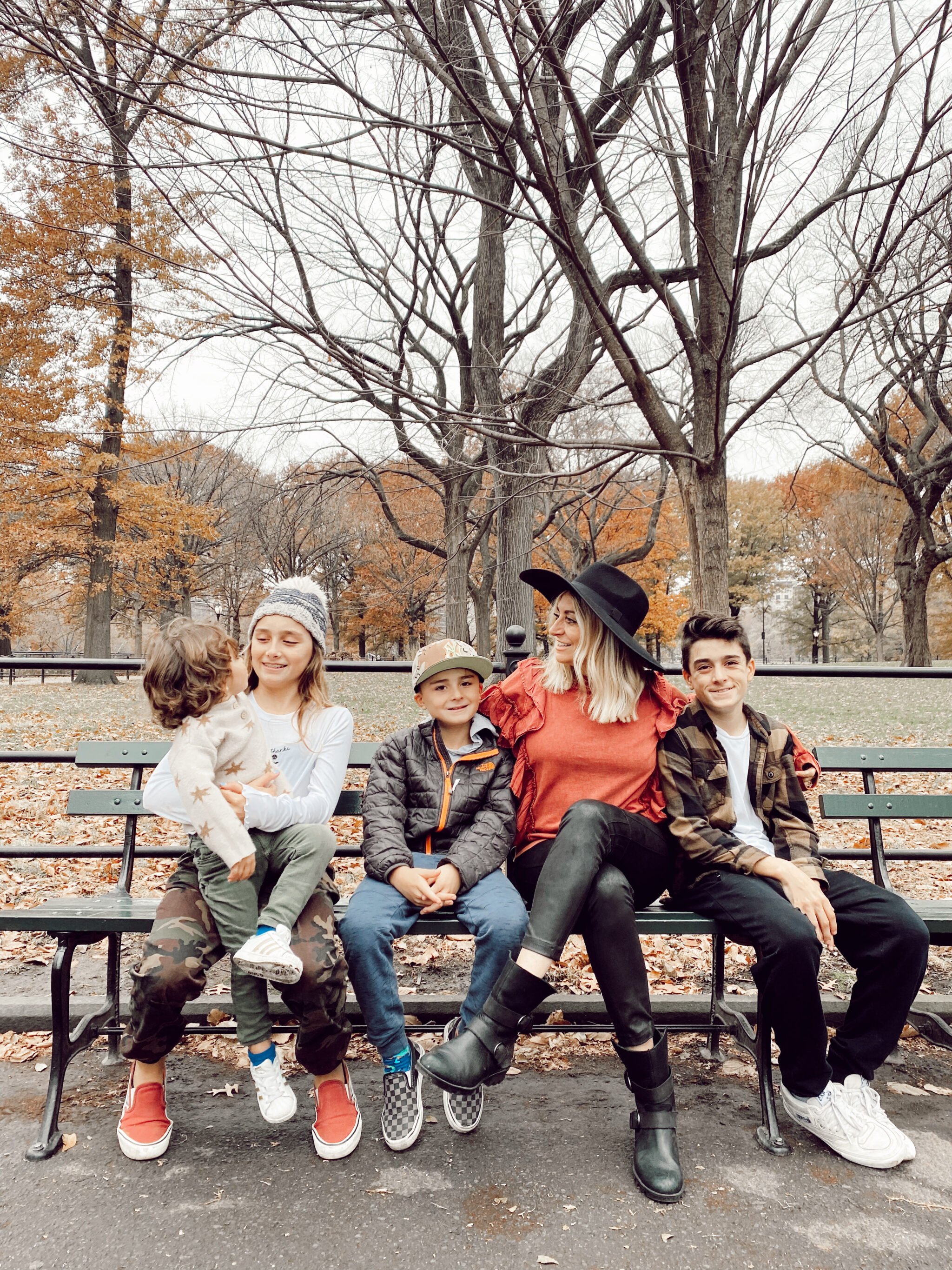 family on park bench