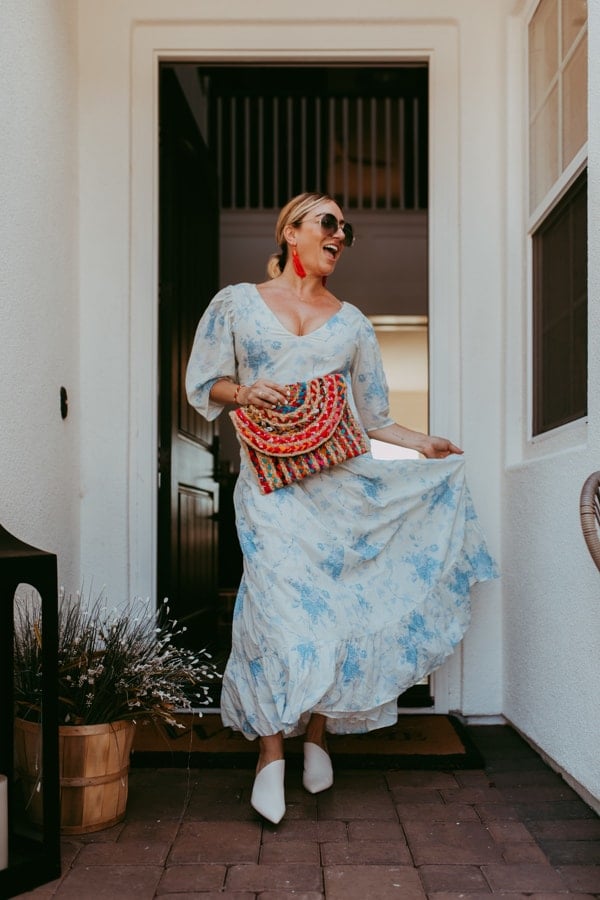 woman walking through doorway