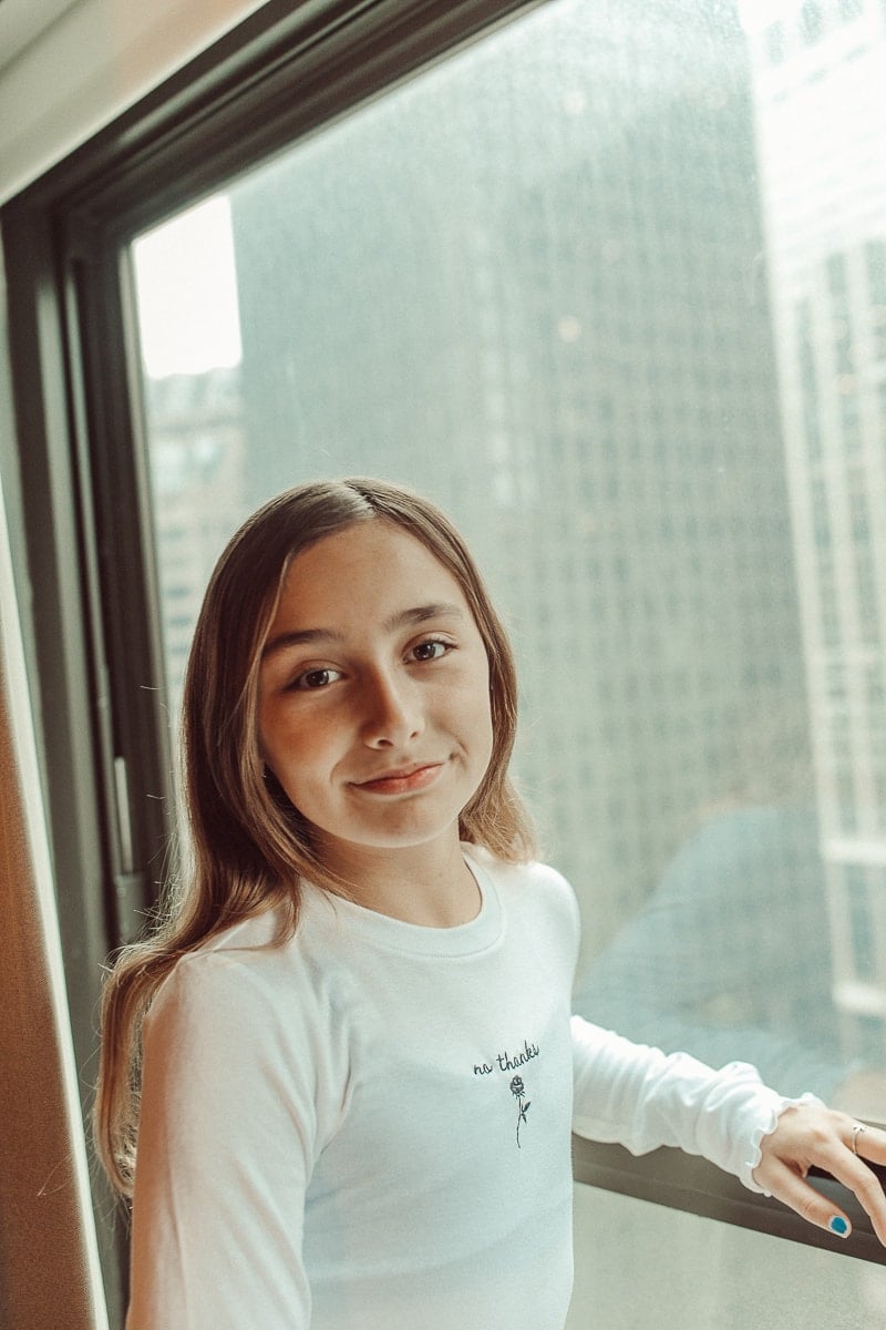 girl looking out window